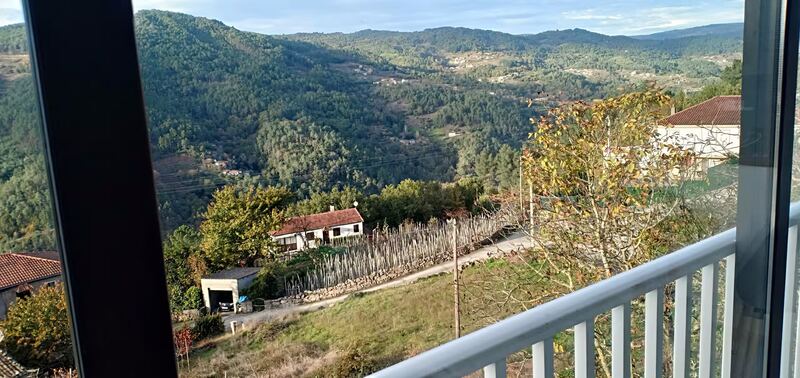 View from the terrace balcony over the vineyards and hamlet toward the Miño valley, Ribeira Sacra